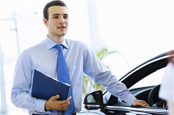 insurance agent with car